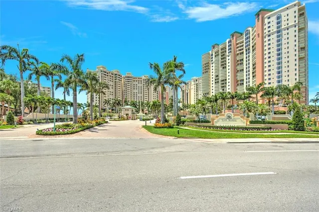 a view of city with tall buildings