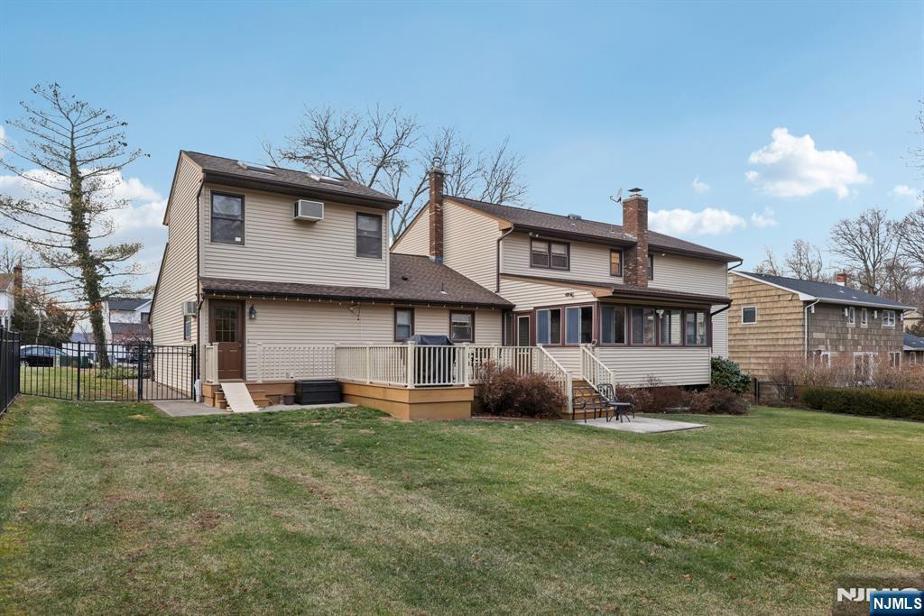 7 Welsh Court Wayne, NJ 07470 - Photo 33 of 40 a front view of a house with garden