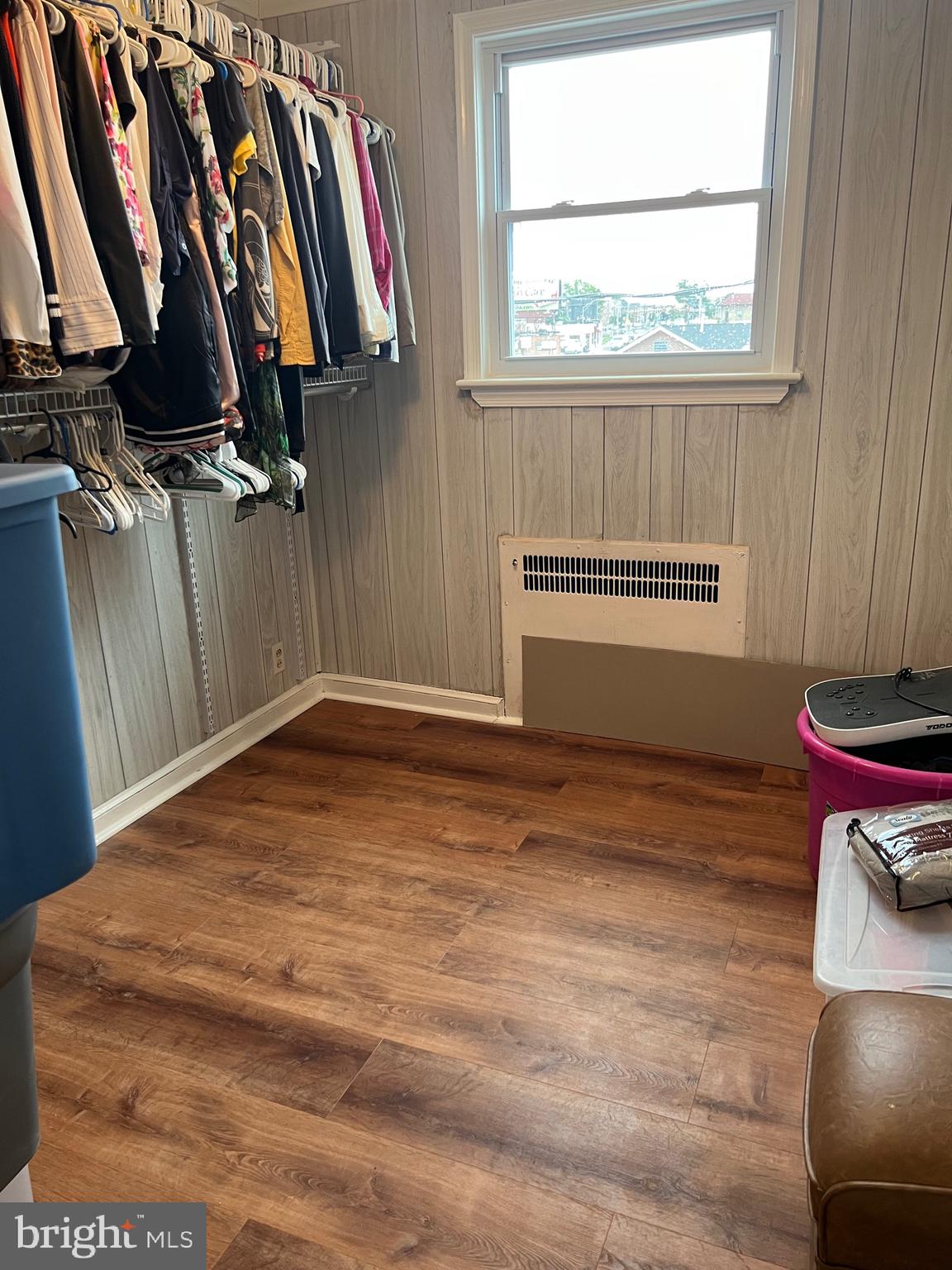 363 Sherbrook Boulevard Upper Darby, PA 19082 - Photo 14 of 22 a view of a room with shelves and wooden floor