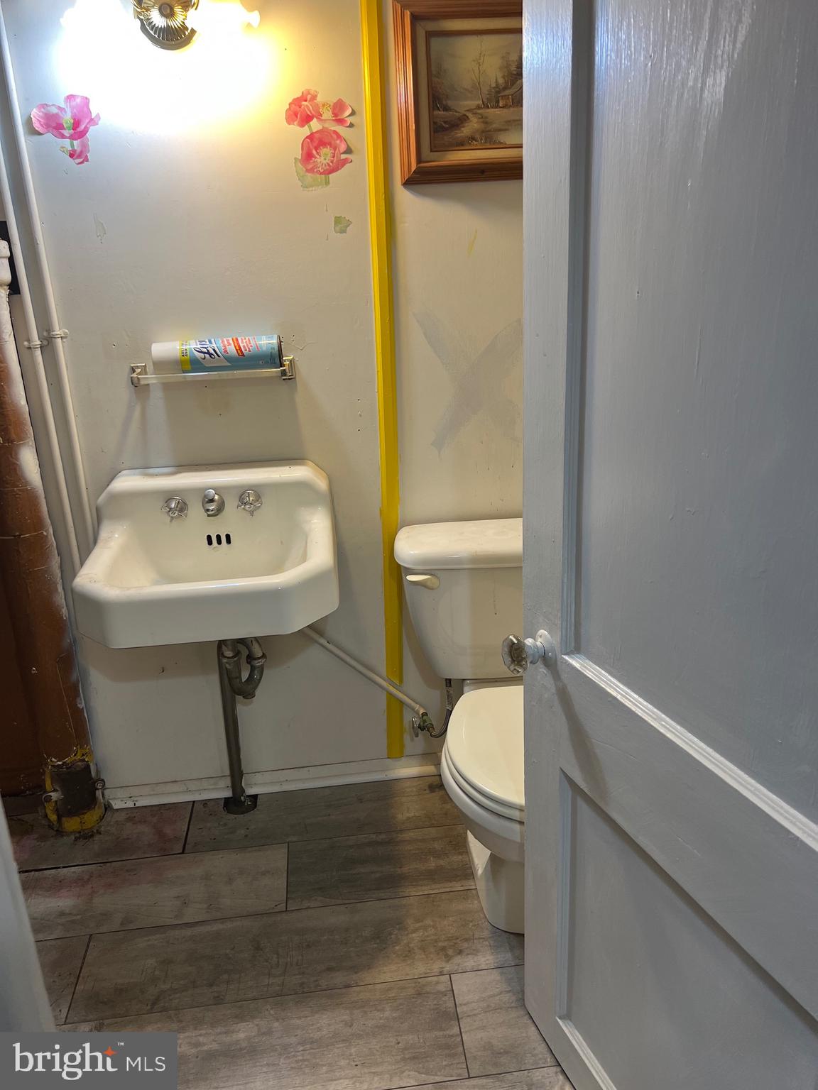 363 Sherbrook Boulevard Upper Darby, PA 19082 - Photo 20 of 22 a bathroom with a sink toilet and a mirror