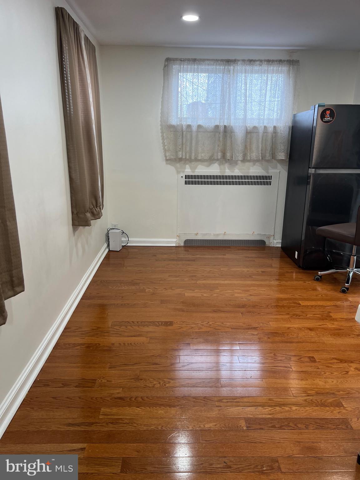 363 Sherbrook Boulevard Upper Darby, PA 19082 - Photo 6 of 22 a view of kitchen with wooden floor and electronic appliances