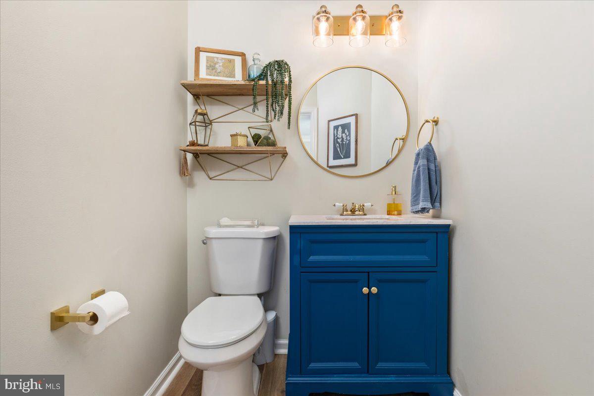 7235 Traphill Way Gainesville, VA 20155 - Photo 12 of 40 a bathroom with a toilet and a sink