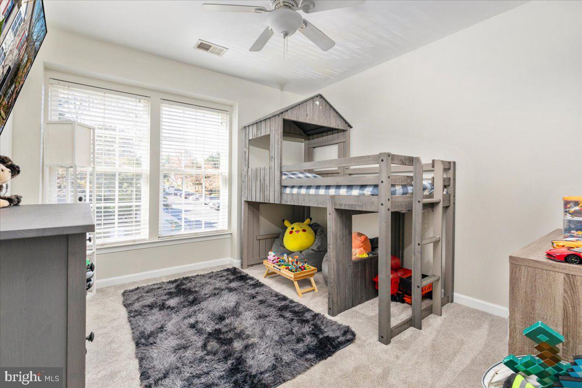 7235 Traphill Way Gainesville, VA 20155 - Photo 14 of 40 a view of living room with furniture and rug
