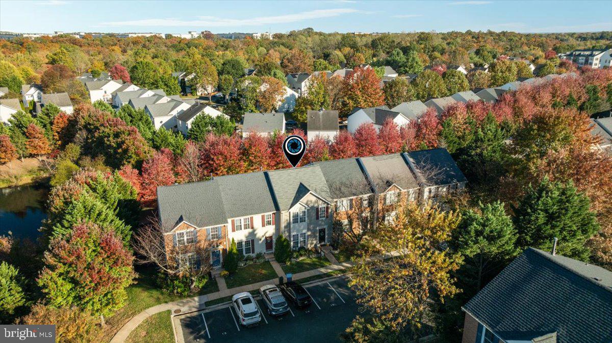 7235 Traphill Way Gainesville, VA 20155 - Photo 37 of 40 an aerial view of a house with a yard