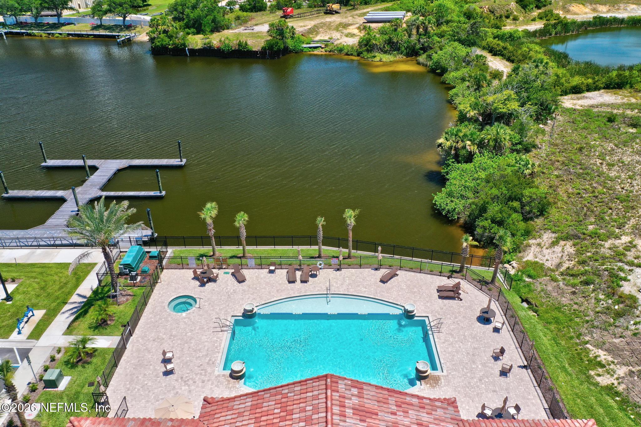 2 Menorca Way Palm Coast, FL 32137 - Photo 13 of 37 an aerial view of a house with swimming pool and outdoor seating