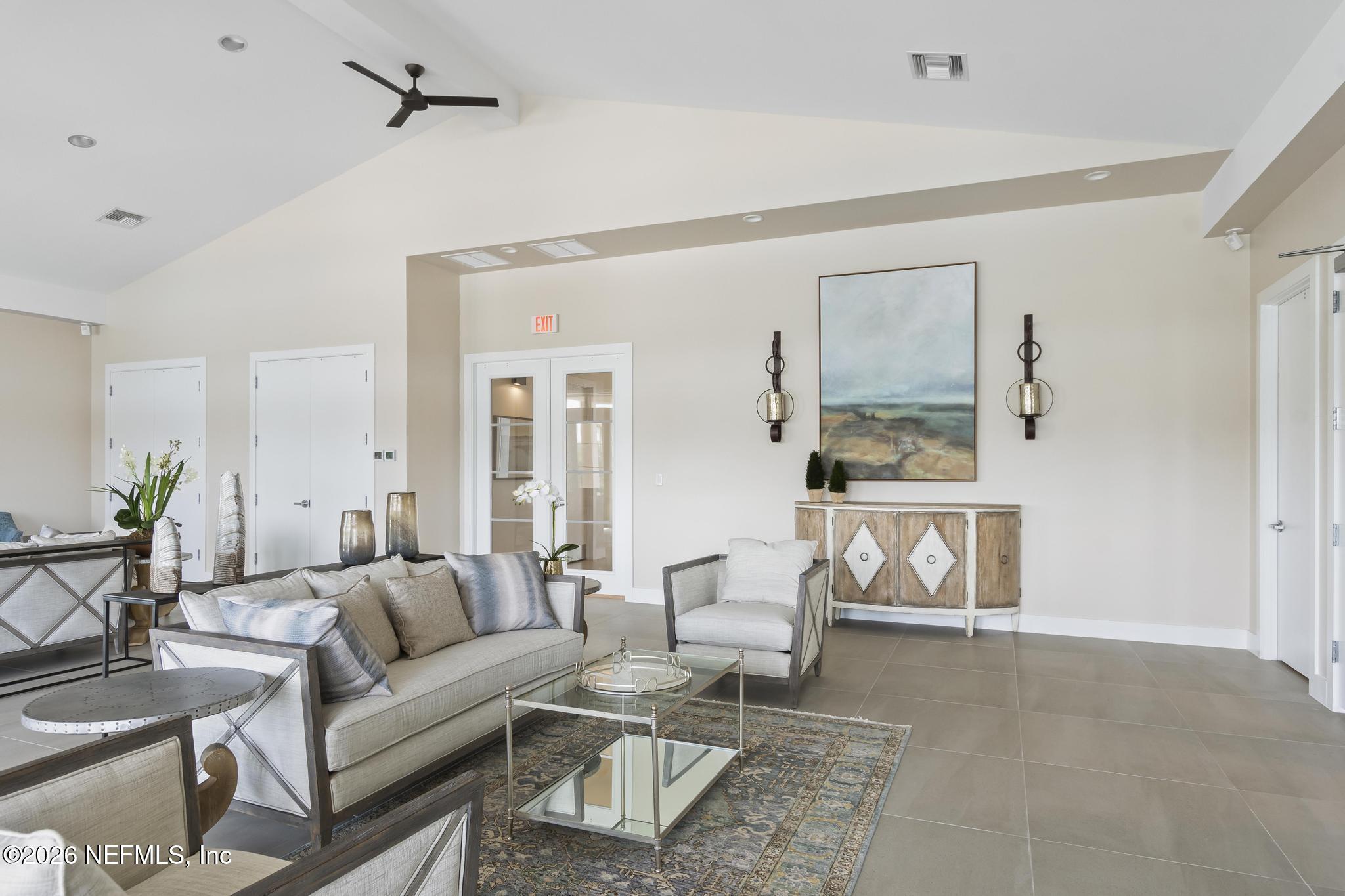 2 Menorca Way Palm Coast, FL 32137 - Photo 19 of 37 a living room with furniture and a wooden floor