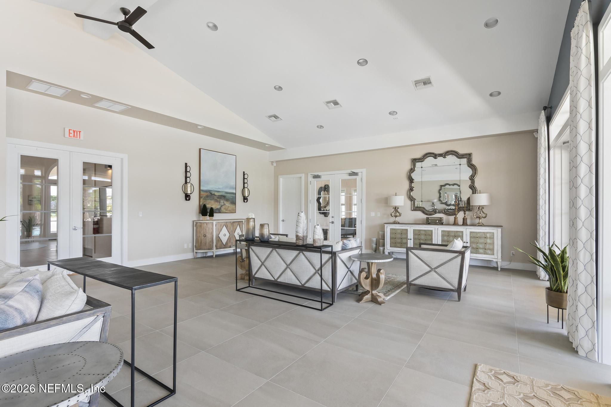2 Menorca Way Palm Coast, FL 32137 - Photo 21 of 37 a living room with furniture and a potted plant