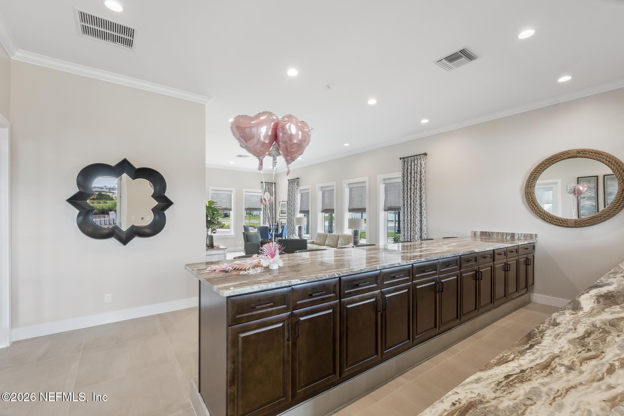 2 Menorca Way Palm Coast, FL 32137 - Photo 27 of 37 a kitchen with stainless steel appliances granite countertop a stove and a sink