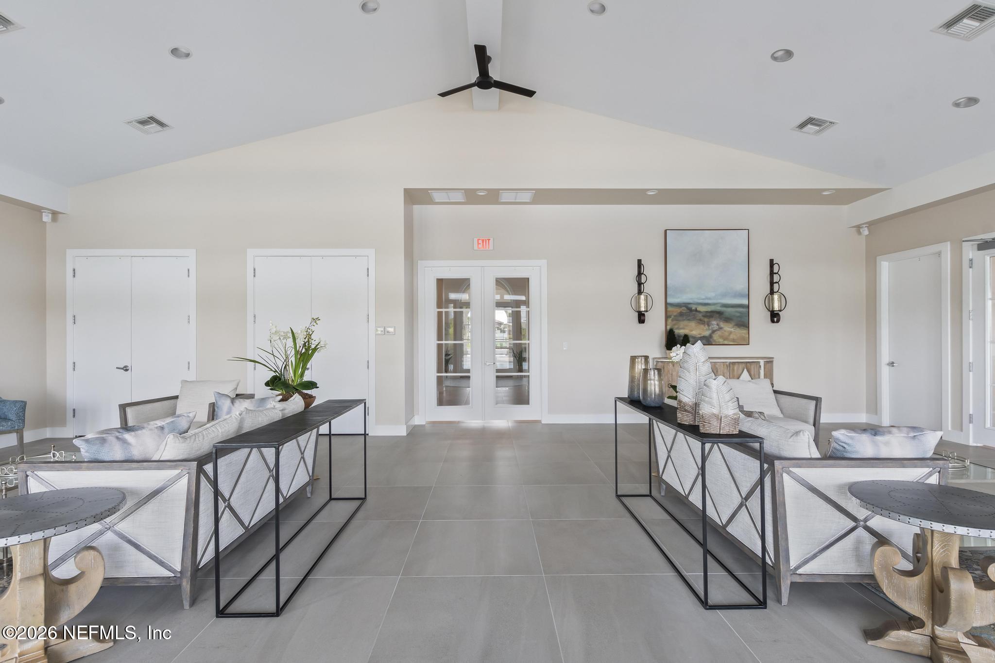 2 Menorca Way Palm Coast, FL 32137 - Photo 33 of 37 a view of a livingroom with furniture and a table