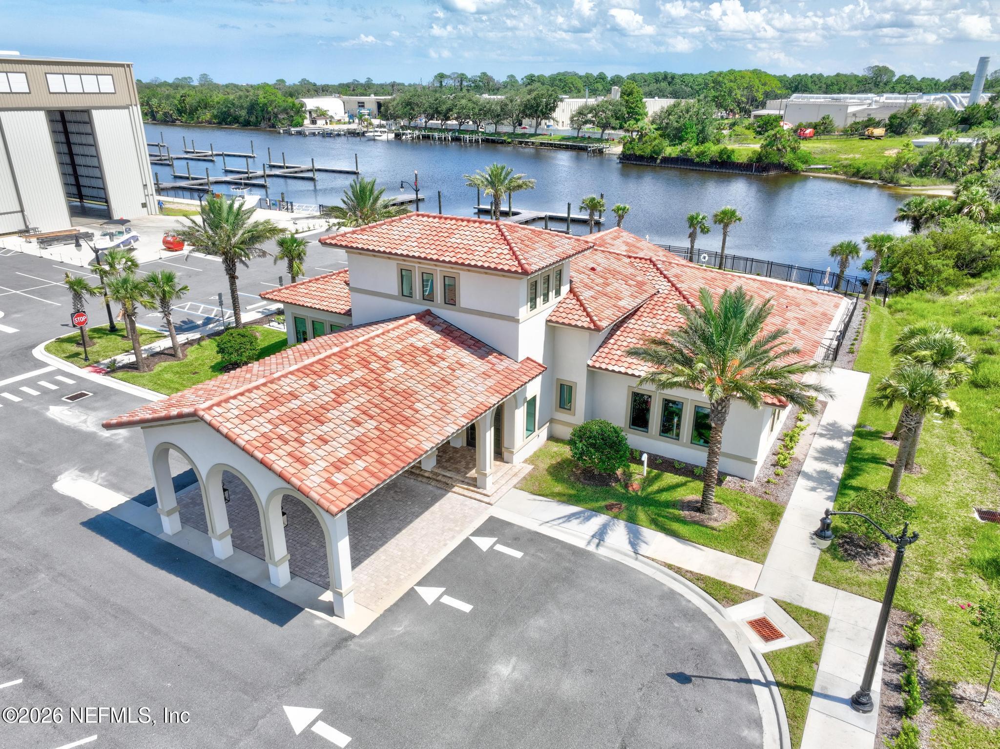 2 Menorca Way Palm Coast, FL 32137 - Photo 7 of 37 an aerial view of a house with a lake view