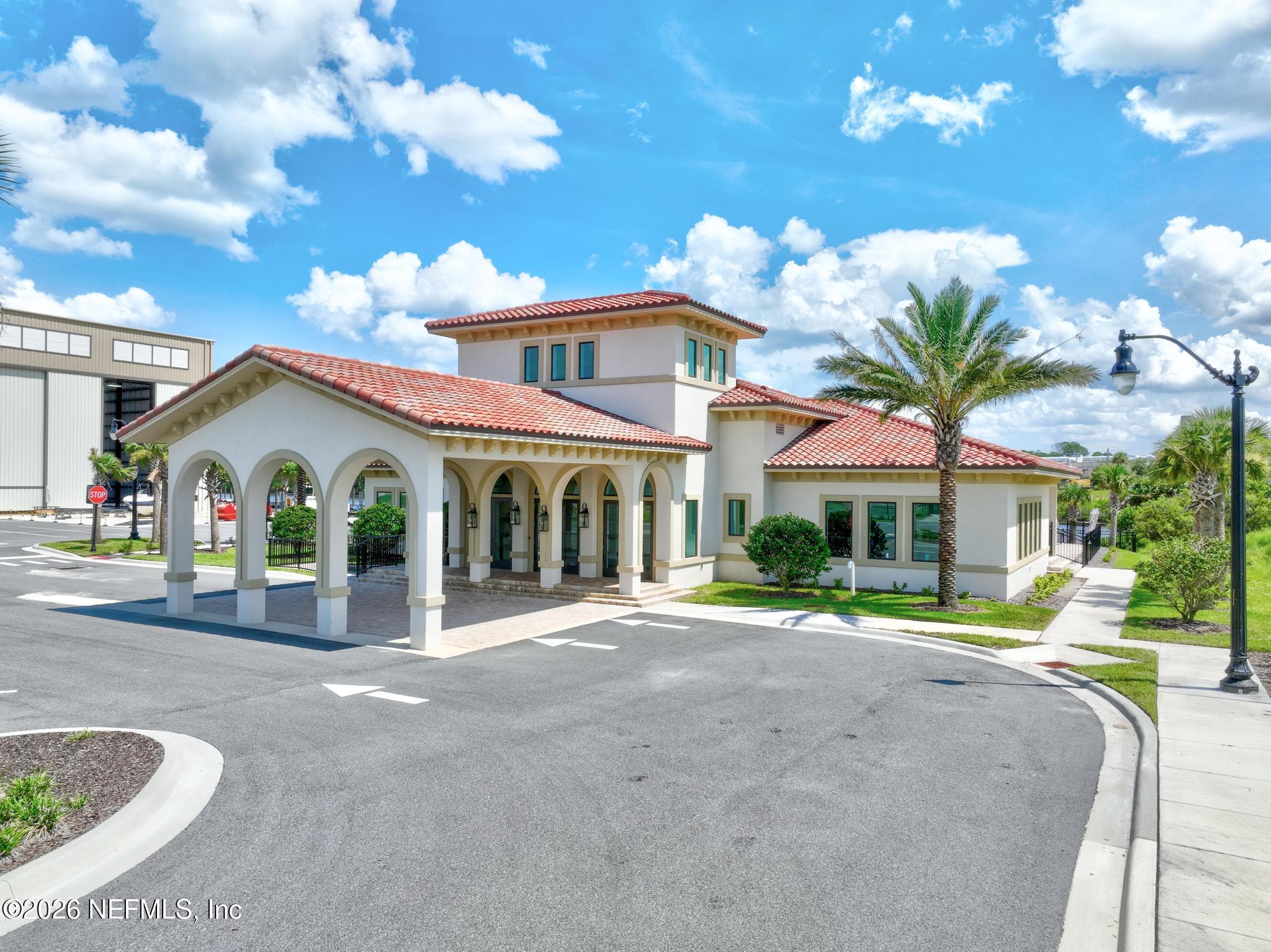 2 Menorca Way Palm Coast, FL 32137 - Photo 8 of 37 a front view of a house with a yard