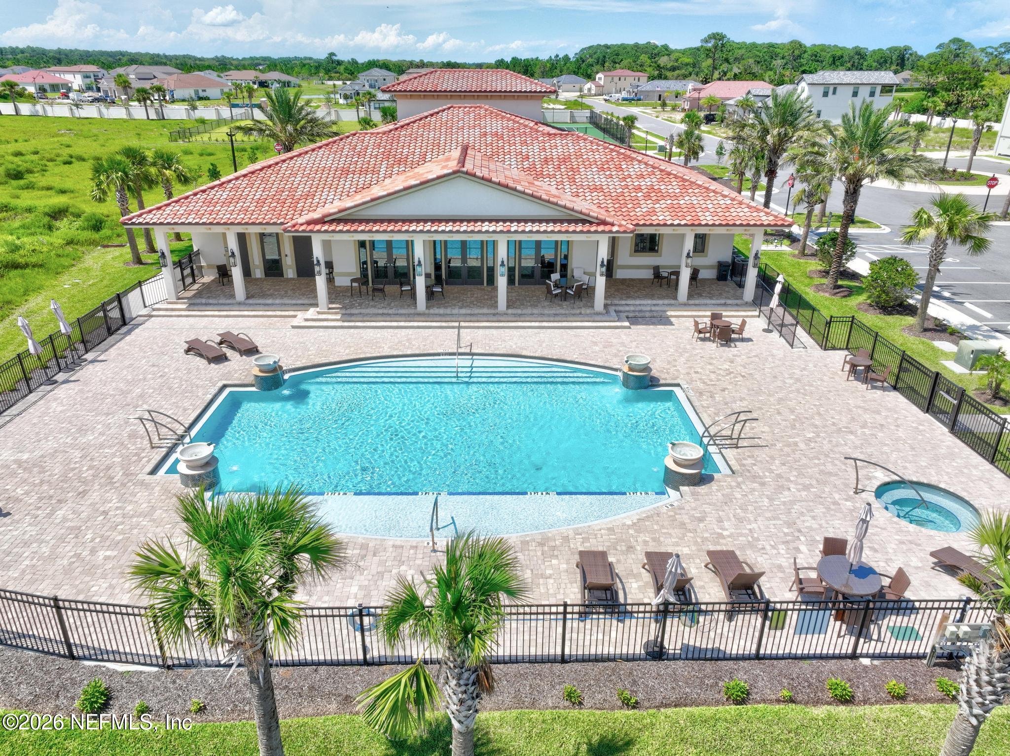 2 Menorca Way Palm Coast, FL 32137 - Photo 10 of 37 an aerial view of a house with garden space and swimming pool