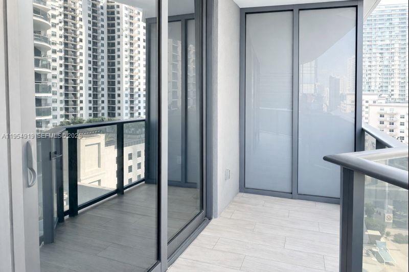 45 Southwest 9th Street, Unit 1208 Miami, FL 33130 - Photo 26 of 27 a view of a hallway with a hallway and stairs