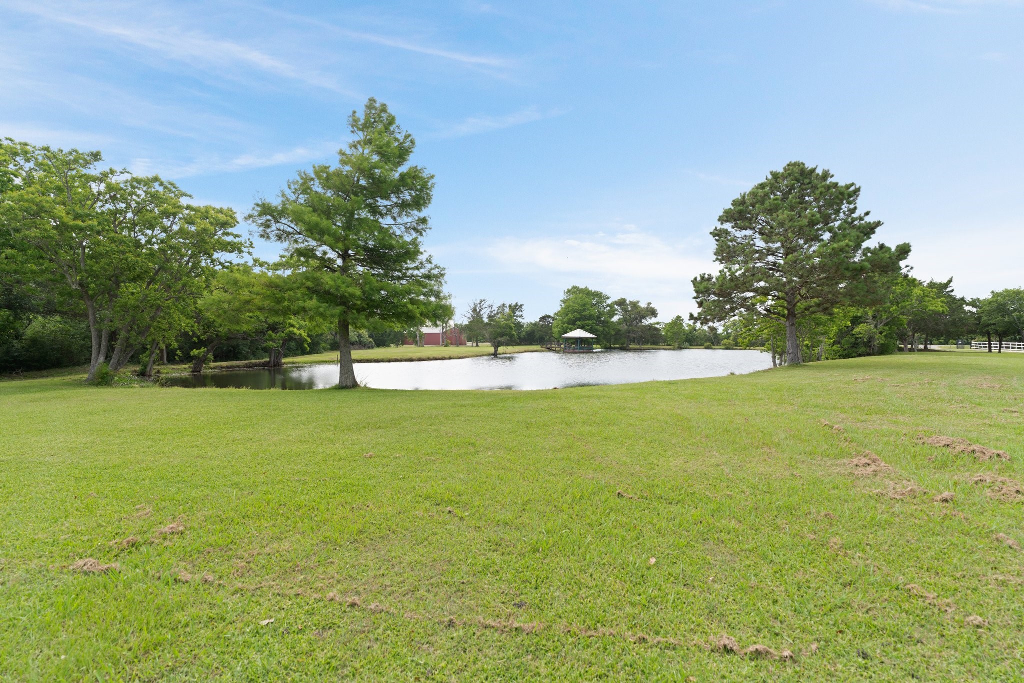 8226 Fm 2354 Beach Baytown, TX 77523 - Photo 28 of 39 A blend of open meadows and mature shade trees create a landscape as functional as it is picturesque.
