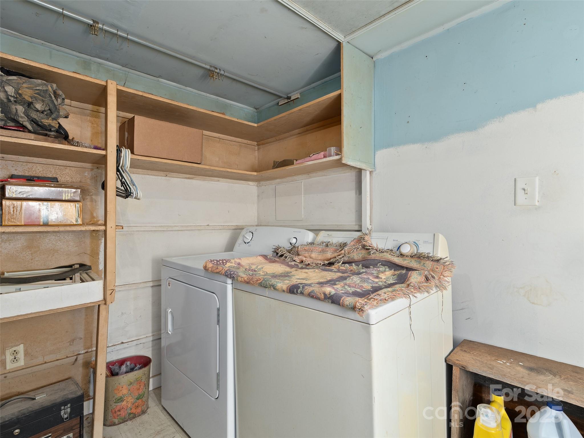 396 Will Hyatt Road Waynesville, NC 28786 - Photo 14 of 23 a bathroom with a granite countertop sink and a mirror