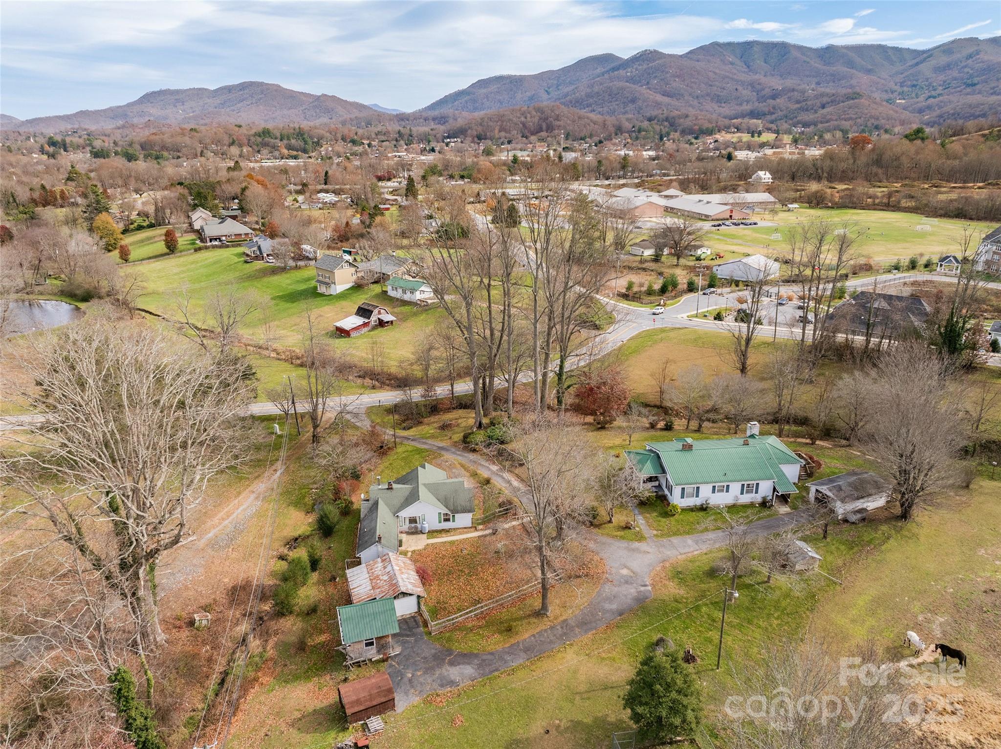 396 Will Hyatt Road Waynesville, NC 28786 - Photo 20 of 23 an aerial view of residential house with outdoor space and river