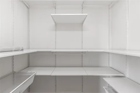 a view of cabinets and window