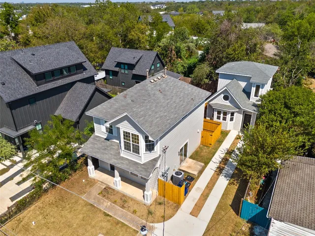 an aerial view of a house with a garden