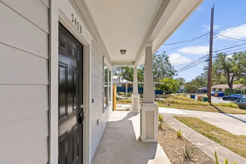 a view of a porch with a tv