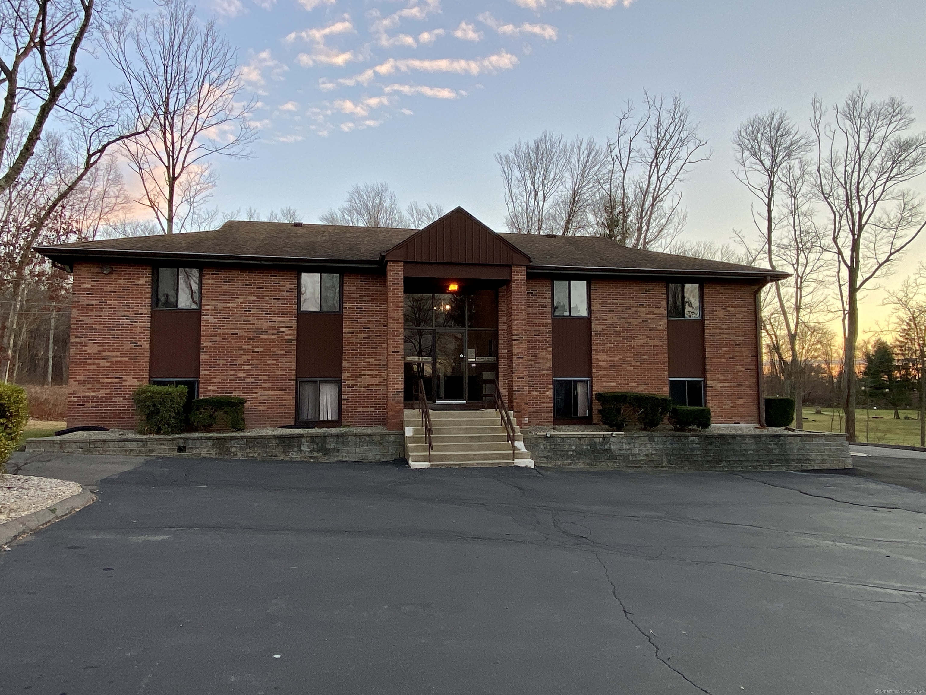 117 Hartford Turnpike Tolland, CT 06084 - Photo 2 of 6 a front view of a house with a garden