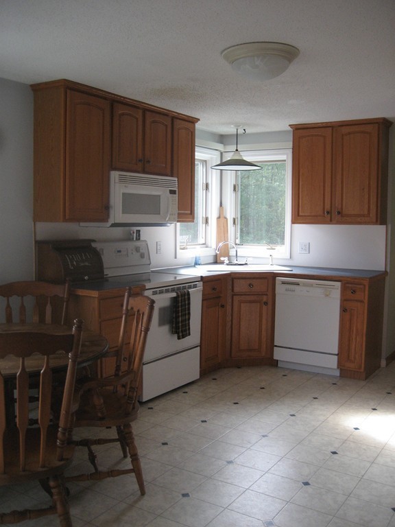 20 Juniper Road Ashburnham, MA 01430 - Photo 11 of 26 a kitchen with a sink and cabinets
