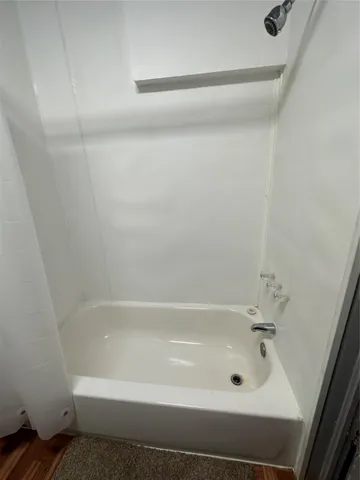a bathroom with a bathtub