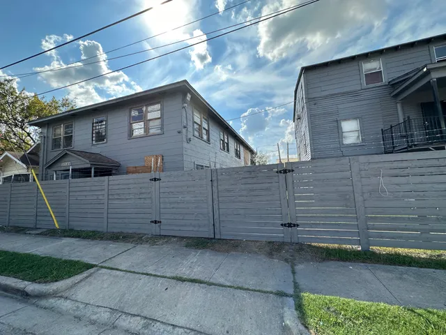 a view of a house with a garage