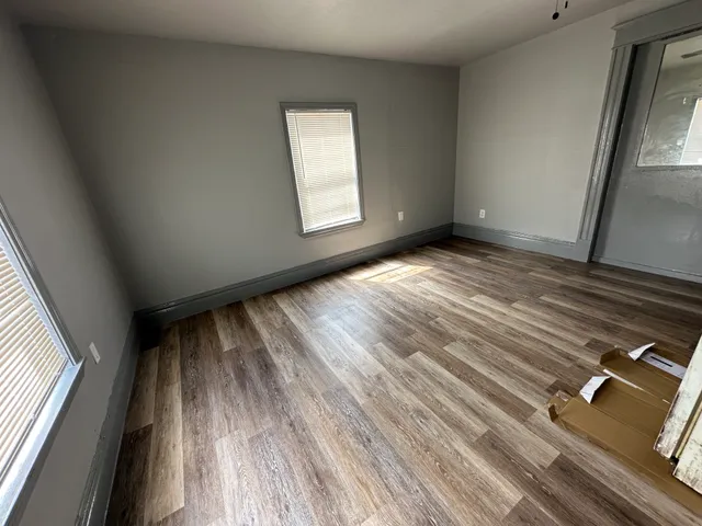 a view of an empty room and window