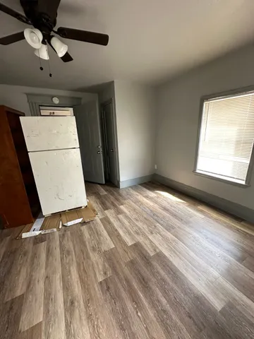 a view of an empty room and window