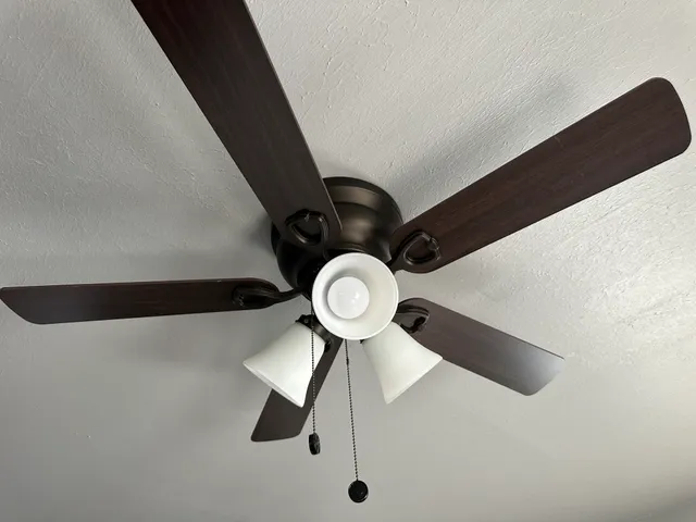 a close view of light fixtures and racks on a wall