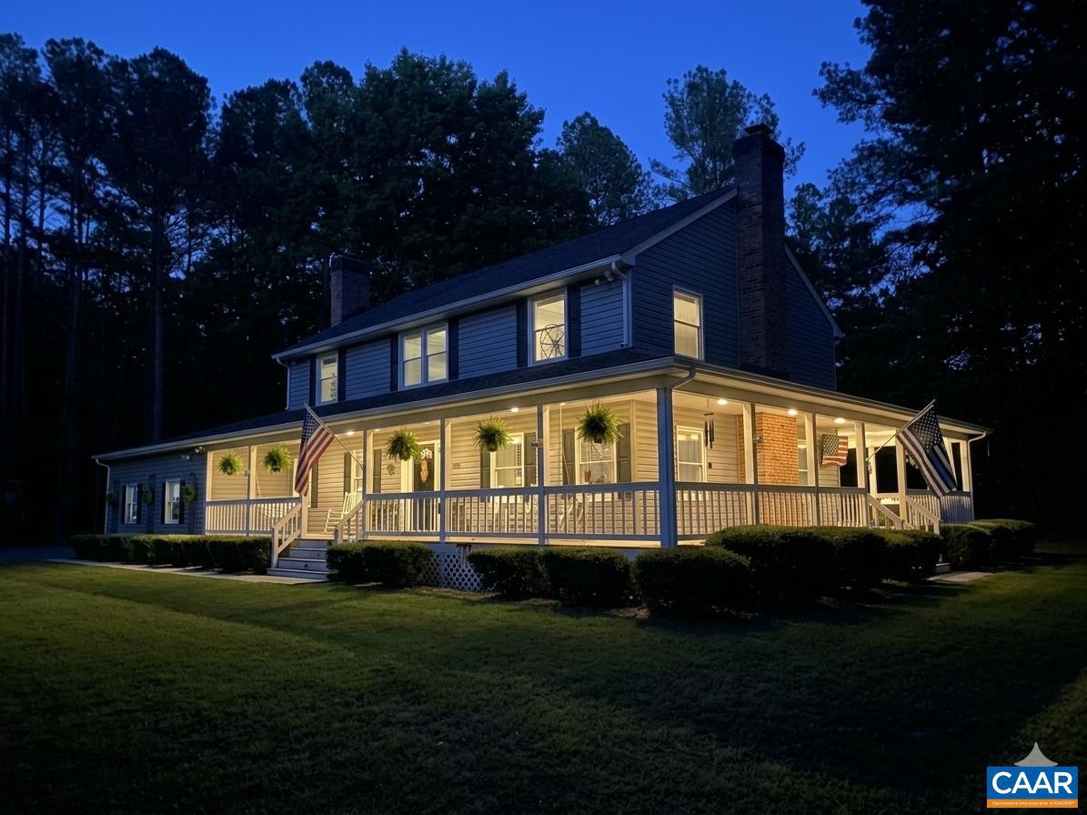 3257 Martin Kings Road Charlottesville, VA 22902 - Photo 45 of 49 a front view of a house with a yard