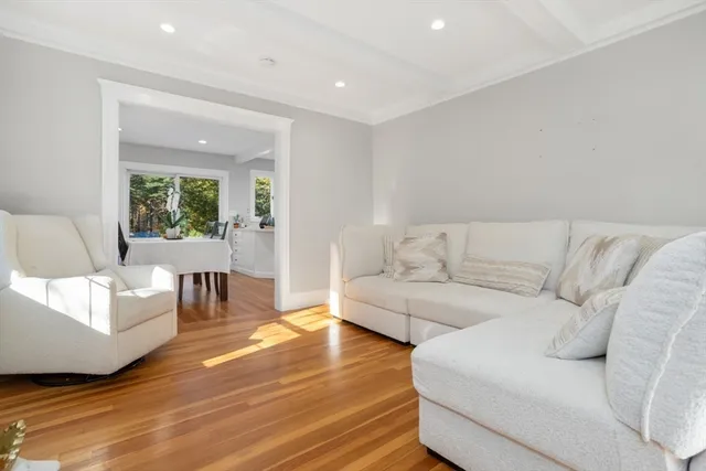 a kitchen with a table chairs stove and cabinets
