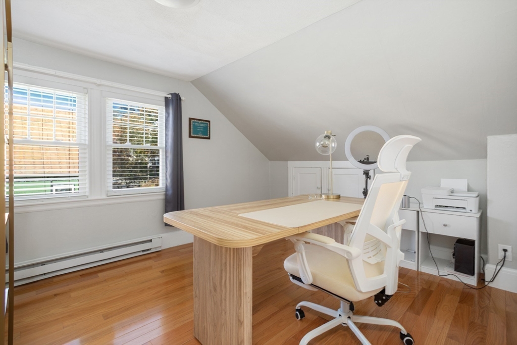 928 Main Street Lynnfield, MA 01940 - Photo 20 of 41 a view of a dining room with furniture window and wooden floor