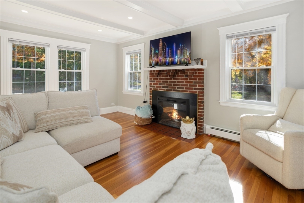 928 Main Street Lynnfield, MA 01940 - Photo 10 of 41 a living room with furniture and a fireplace