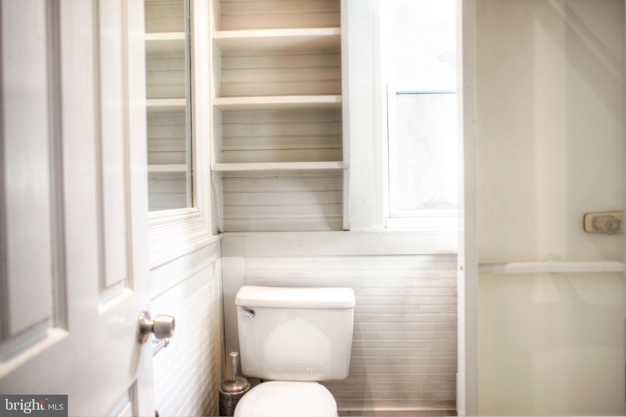 1228 Catharine Street Philadelphia, PA 19147 - Photo 15 of 32 a bathroom with a toilet and a shower