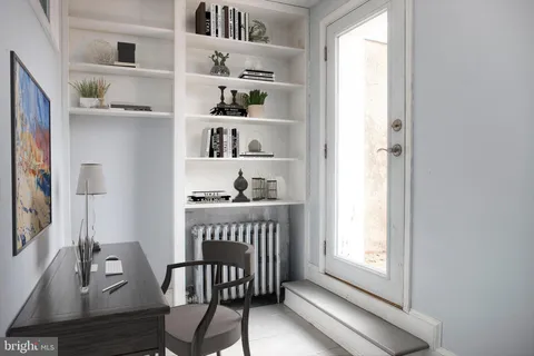 a view of a room with rack on the wall