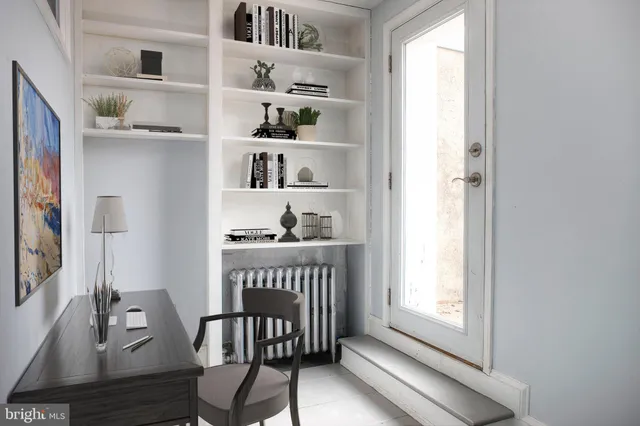 a view of a room with rack on the wall