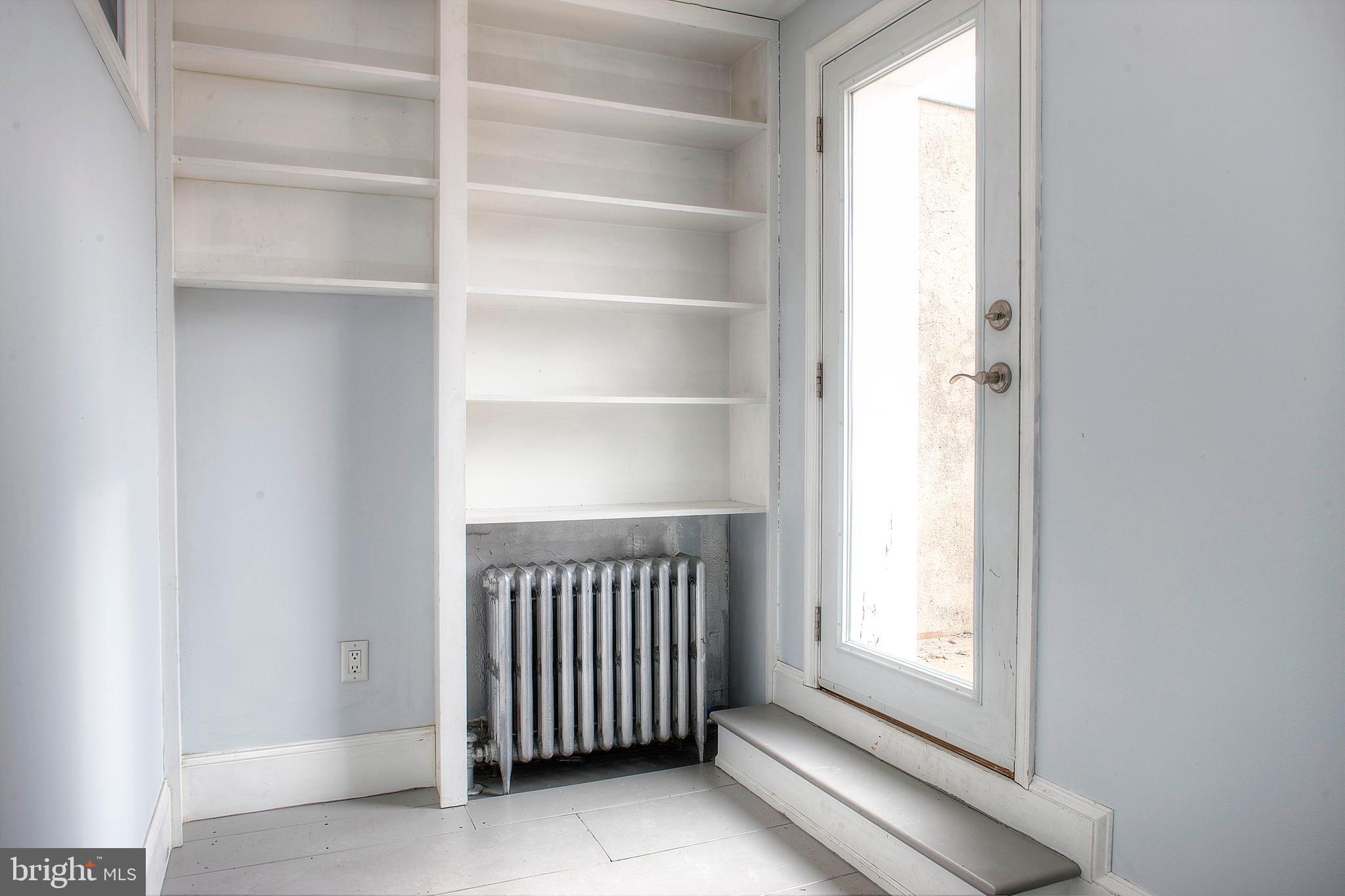 1228 Catharine Street Philadelphia, PA 19147 - Photo 24 of 32 a view of a room with rack on the wall