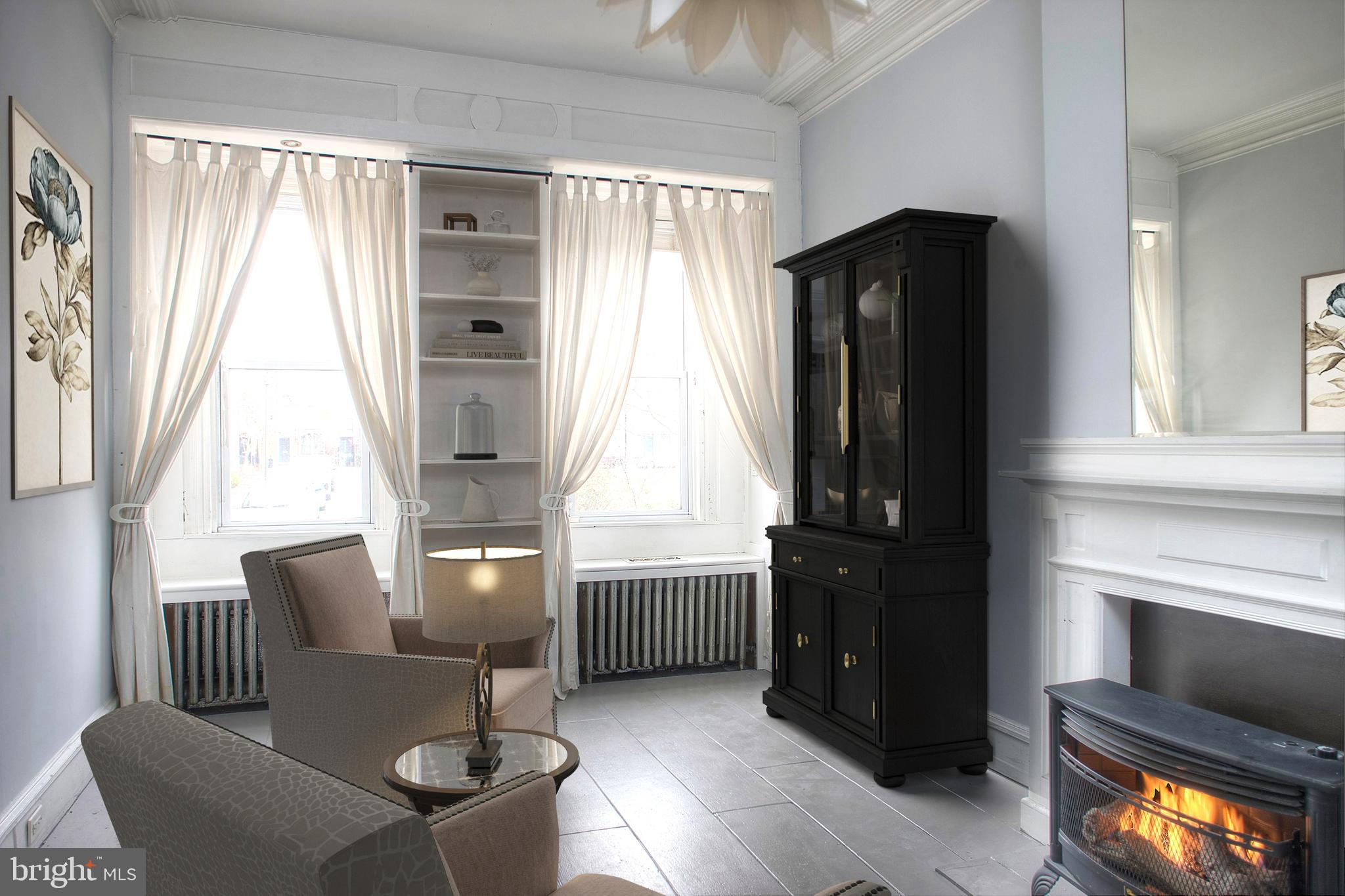1228 Catharine Street Philadelphia, PA 19147 - Photo 4 of 32 a living room with furniture and a window