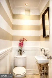 a view of a dining room with furniture and window