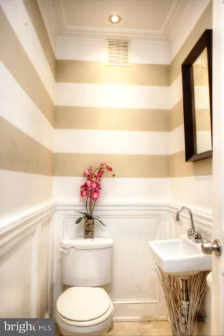 a view of a dining room with furniture and window