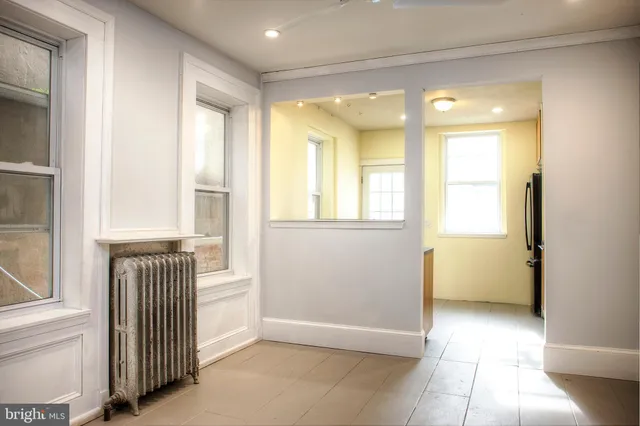 a kitchen with a stove and a sink