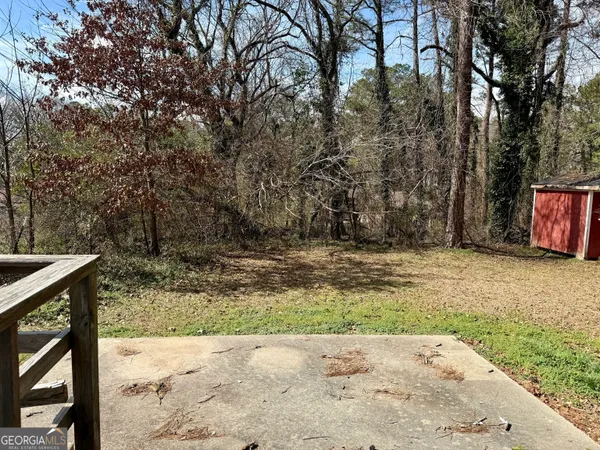 a view of swimming pool with a yard