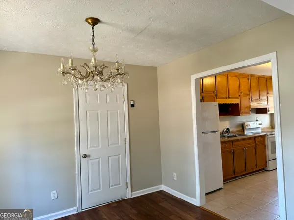 a view of a room with a chandelier