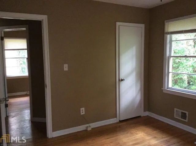 a bathroom with a sink toilet and tub
