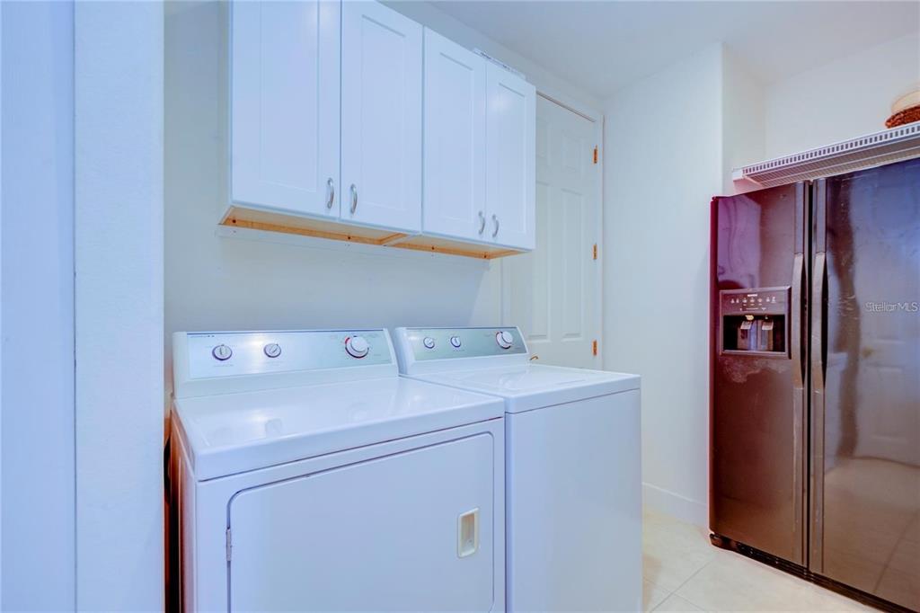 7352 Gulf Way Hudson, FL 34667 - Photo 17 of 69 a utility room with dryer and washer