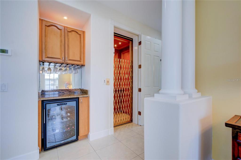 7352 Gulf Way Hudson, FL 34667 - Photo 18 of 69 a view of an entryway with wooden floor