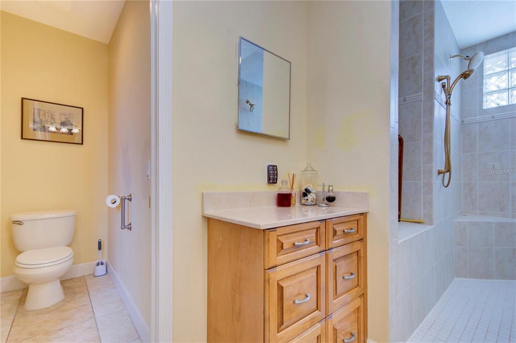 7352 Gulf Way Hudson, FL 34667 - Photo 24 of 69 a view of a bathroom with a sink and a toilet