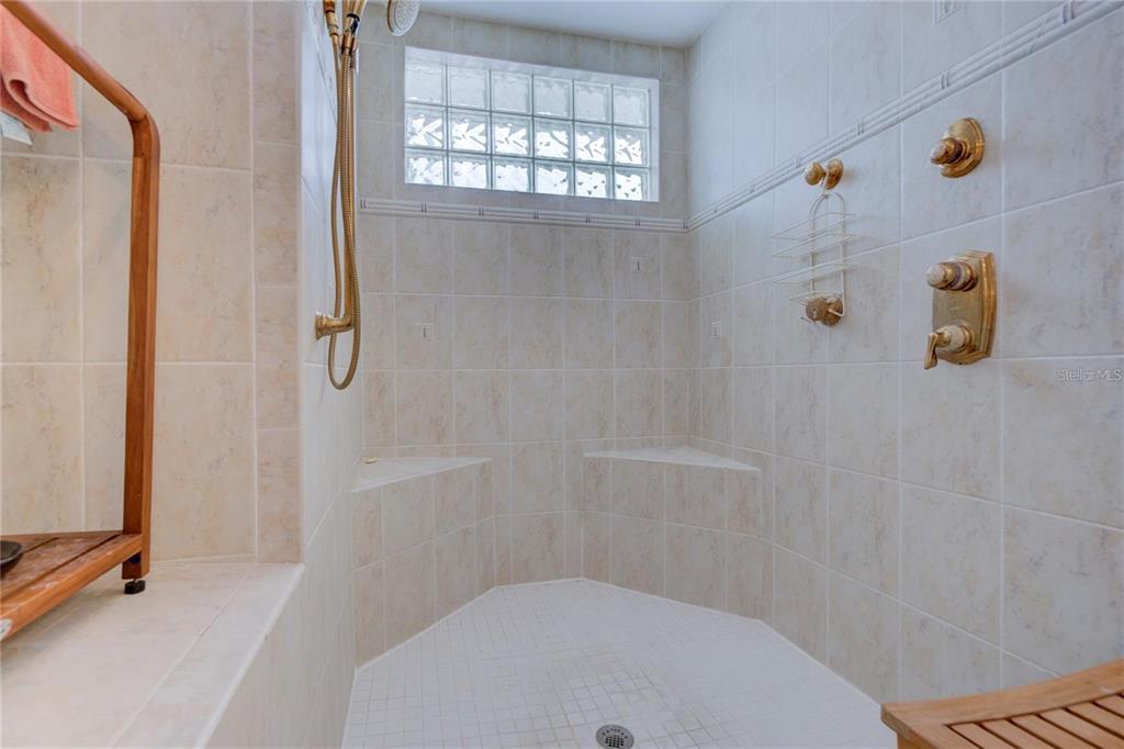 7352 Gulf Way Hudson, FL 34667 - Photo 25 of 69 a bathroom with a sink toilet and shower