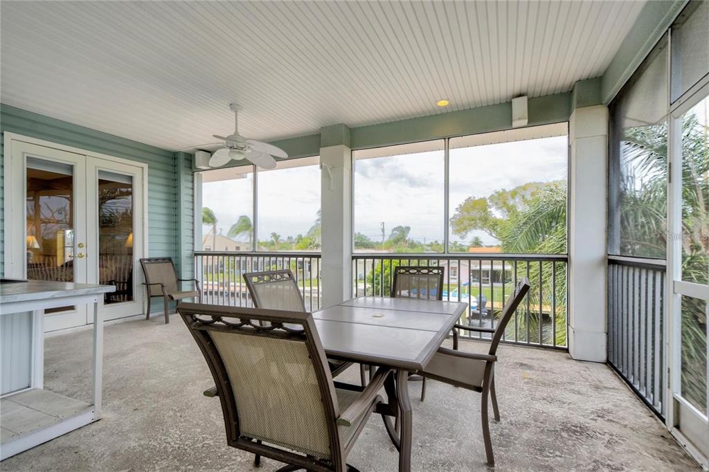 7352 Gulf Way Hudson, FL 34667 - Photo 29 of 69 a dining room with furniture window and outside view